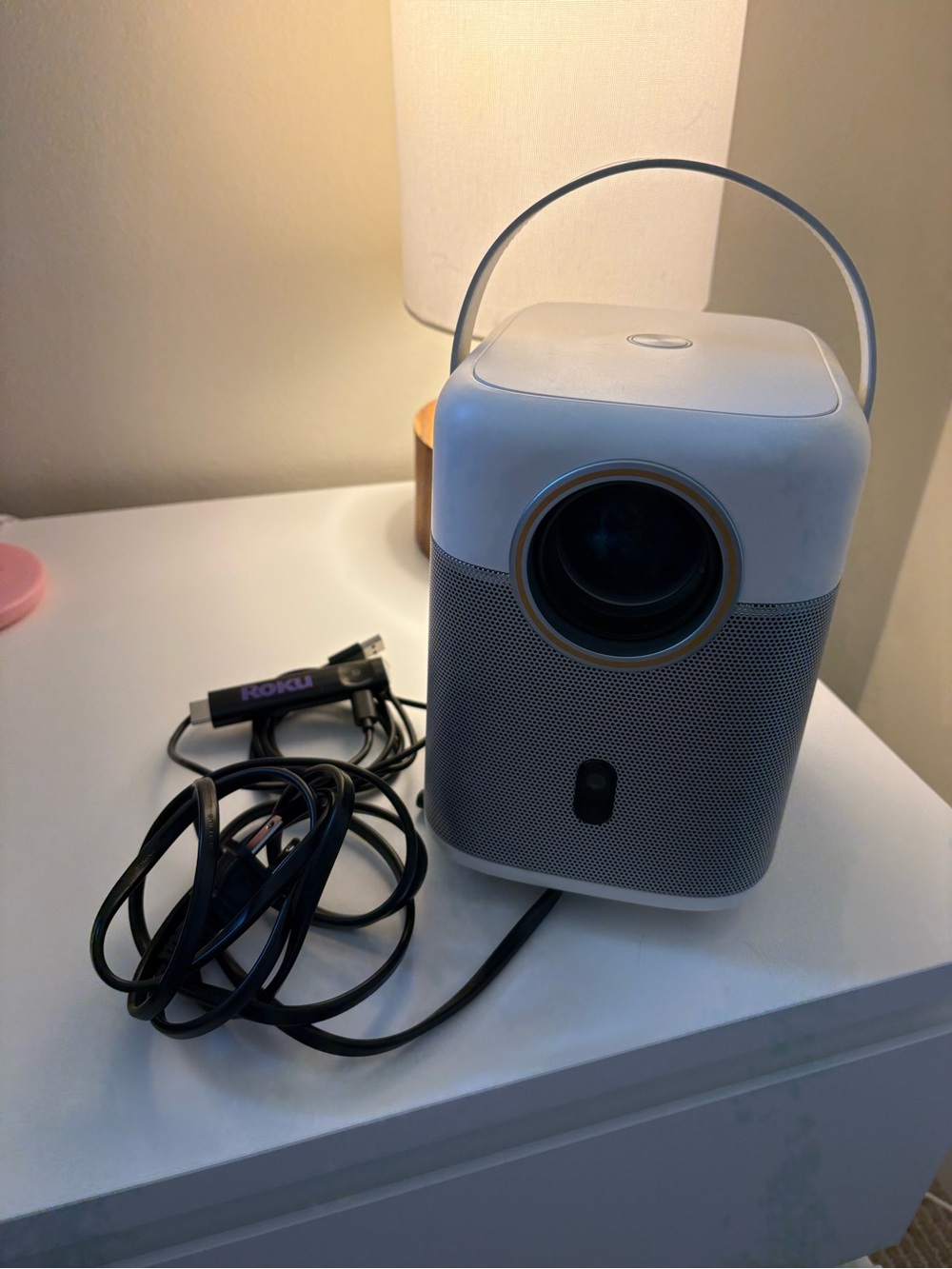Portable White Projector with Roku Streaming Dongle